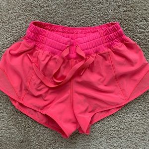 Lululemon hotty hot low rise 2.5” short. Like new. Size 2. Pinky orange color